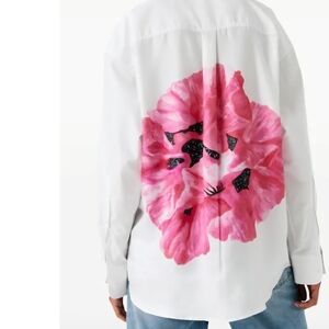 White Shirt with Pink Floral Design On Back